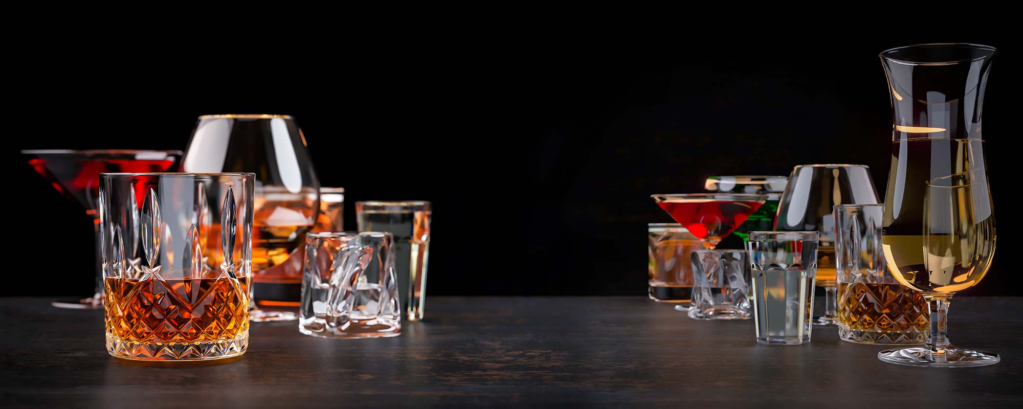 An assortment of different drinks and glasses